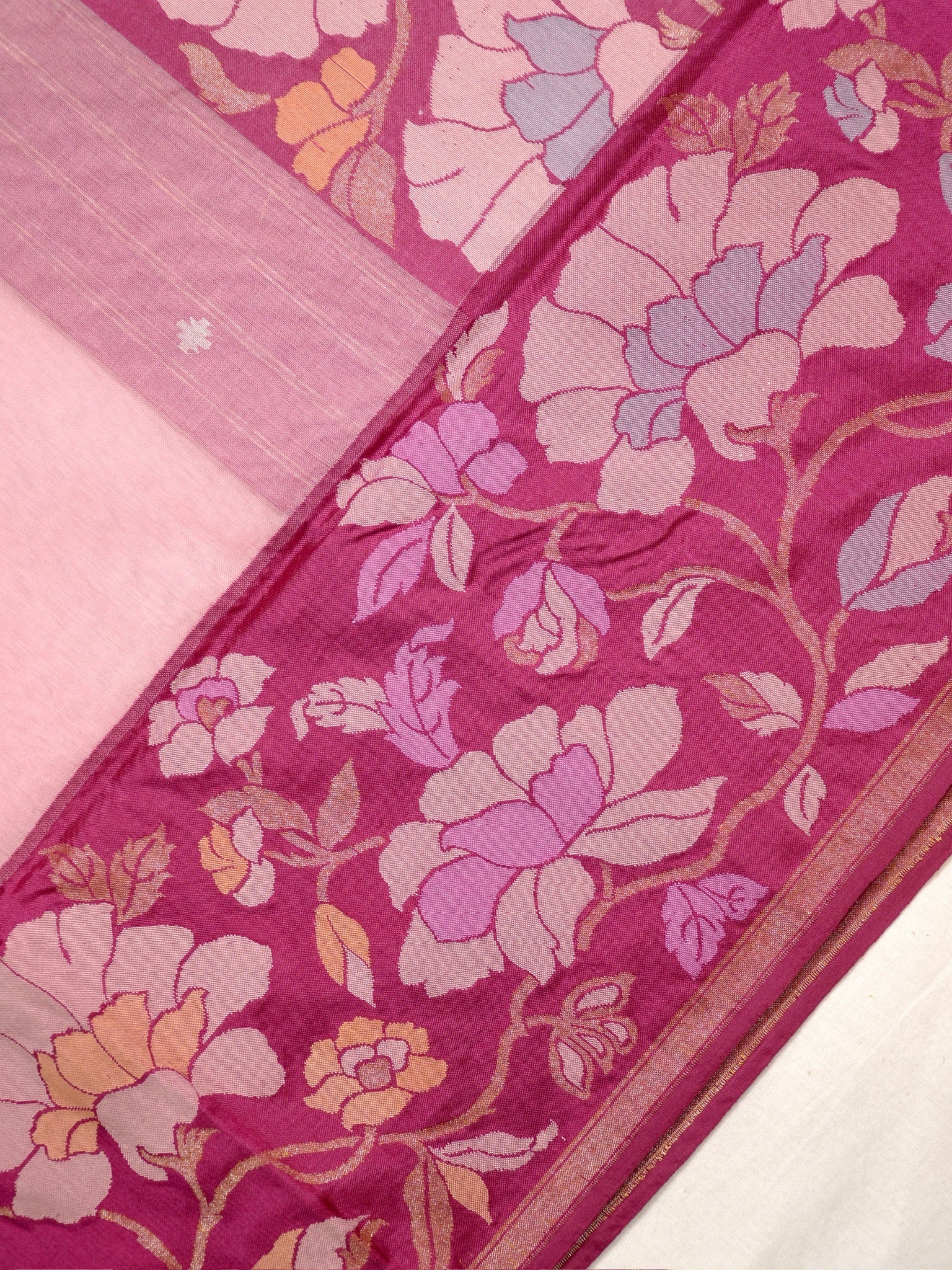 Blush Pink Handwoven Organza Silk Saree with Floral Zari Borders