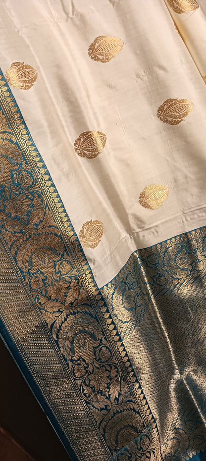 White With Teal Contrast Border Pure Banarasi Puna Silk Saree