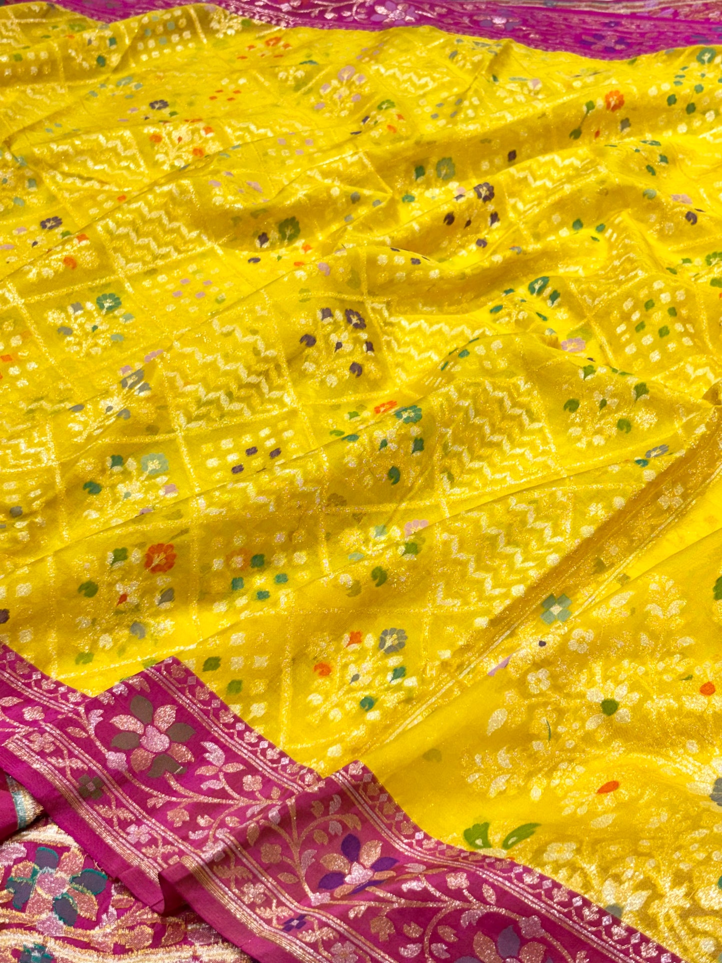 Yellow Ektara kora silk Jamdani Cutwork Zari Border Anchal Mina Work Saree